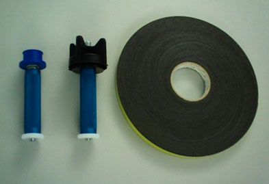 Páska a držák pro ruční natahování