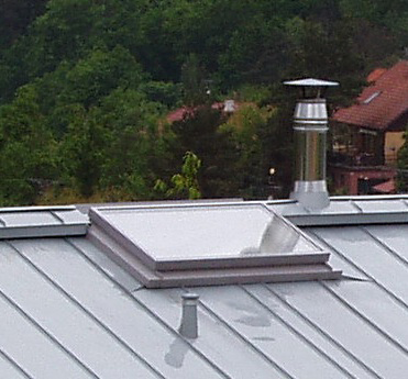 Titanzinkový plech Rheinzink na rodinném domě ve Vranově u Brna