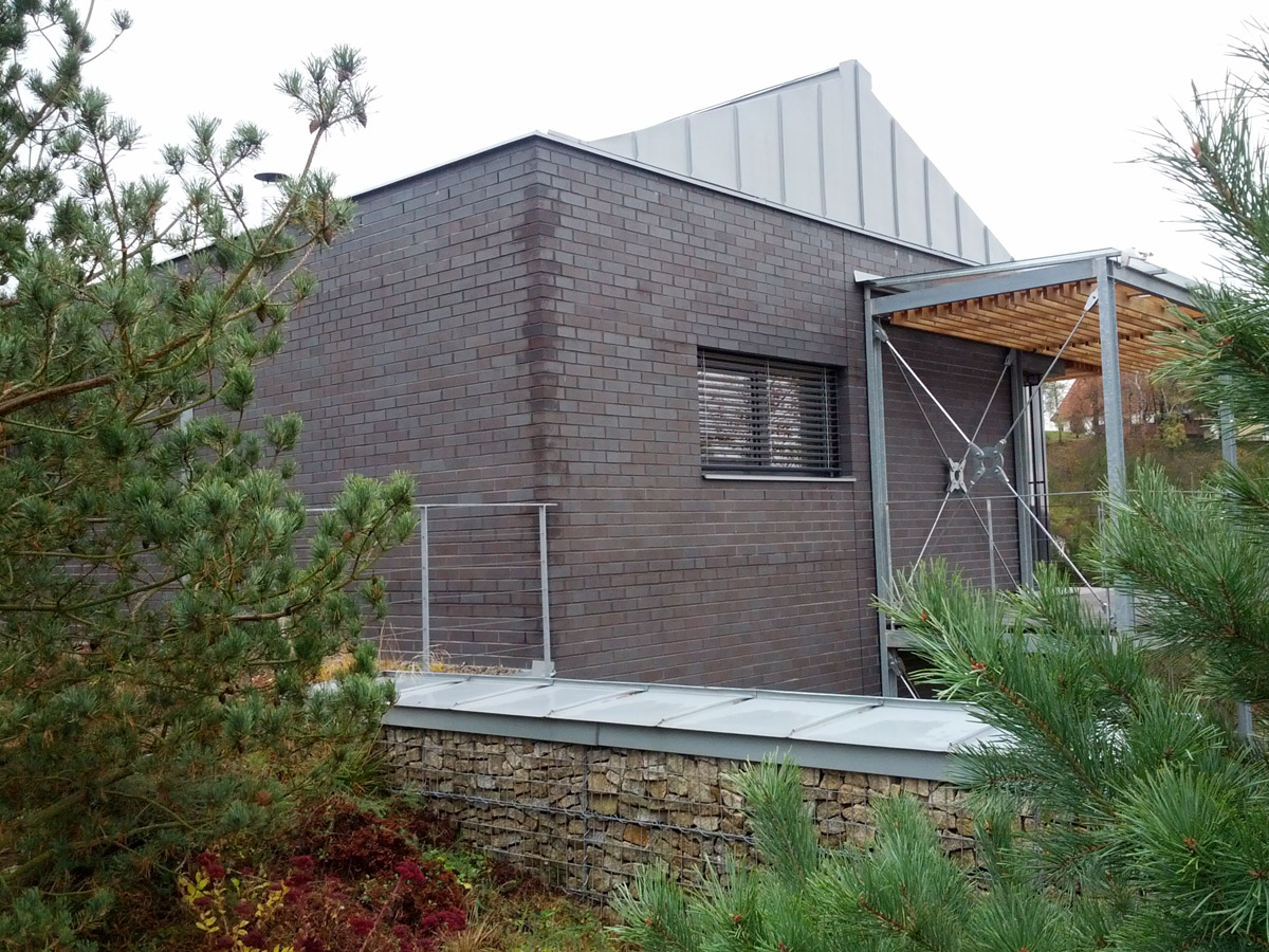 Titanzinkový plech Rheinzink na rodinném domě ve Vranově u Brna