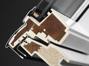 Vysoce účinný systém izolace VELUX ThermoTechnology je u bezúdržbových oken tvořen dřevěným jádrem z tepelně upraveného dřeva (Thermal Modified Timber), čímž je zajištěna lepší izolační schopnost střešního okna