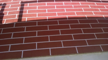 Akrylátová omítka CT 60 VISAGE na fasádě nové čistírny odpadních vod v Křelově-Břuchotíně