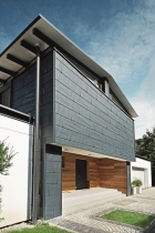 Fasádní panely PREFA FX.12 a fasádní desky REYNOBOND na rodinném domě v Borince