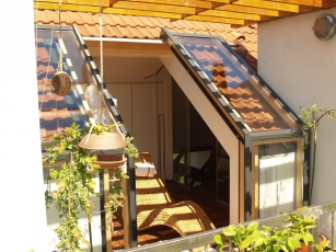 Zalomené posuvné střešní dveře Solara PERSPEKTIV v Praze