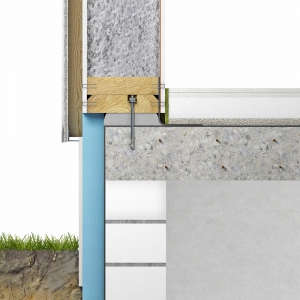 Napojení podlahy a vnější stěny. Vnější fasáda s omítkou a odvětrávanou mezerou a Fermacell Vapor jako vnitřní opláštění. Izolace v dutém prostoru stěny. Přitom je důležité dbát na dostatečnou vzdálenost dřevěných dílů nosné konstrukce od země (oblast stříkající vody 300 mm).