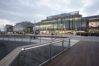 Architektonické řešení vychází ze snahy podřídit hmoty areálu stavbám v blízkém okolí a v centru města Olomouce