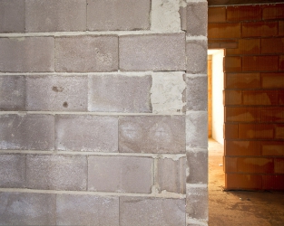 Britská čtvrť, developer FINEP využívá tvarovky Liapor u mezibytových stěn a příček