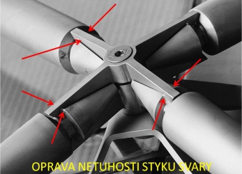 Obr. 9b: Příhradovina zdeformovaná od připevněného skleněného pláště. Styk, který měl působit dle návrhu jako samosvorný, ale jeho konstrukce takové působení ve všech směrech neumožňovala. Styk po přivaření všech ramen styčníku ke kuželovým koncům prutů byl schopen přenést působící zatížení prosklení.