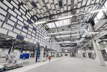 Akustické řešení v průmyslové hale se stěnovými a stropními absorbéry Heradesign®