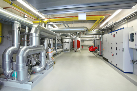 Epoxidový podkladní nátěr StoPox WG 100 a epoxidový vodný nátěr matt StoPox WE MattSiegel na podlahách energetické centrály bytových domů v Leverkusen-Opladen 