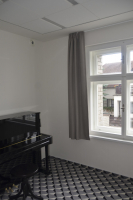 Akustický koberec a akustický obklad stěn v učebnách hudební školy