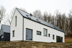 Rodinný dům, Pulečný. Zateplovací systém Baumit. Povrchová úprava Baumit NanoporTop