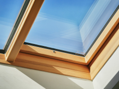 Prosvětlení a ventilace střešních prostor v domě Franze Kafky v Praze