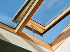 Prosvětlení a ventilace střešních prostor v domě Franze Kafky v Praze