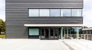 Název pavilonu evokuje očekávané vědecké úspěchy, je také zkratkou odvozenou z náplně budovy, tedy informatické a matematické posluchárny – auditorium – knihovna – Troja