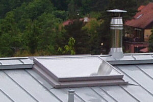 Titanzinkový plech Rheinzink na rodinném domě ve Vranově u Brna